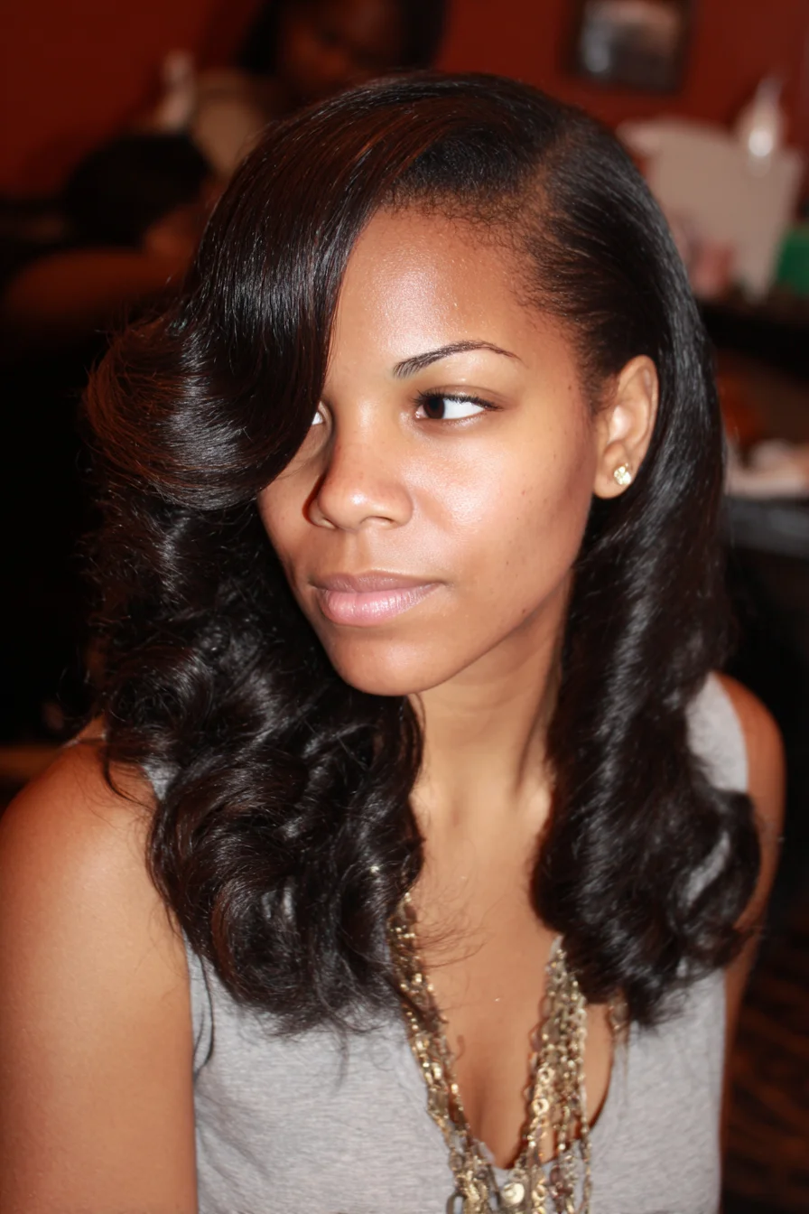 Side-Swept Voluminous Blowout with Large S-Curls